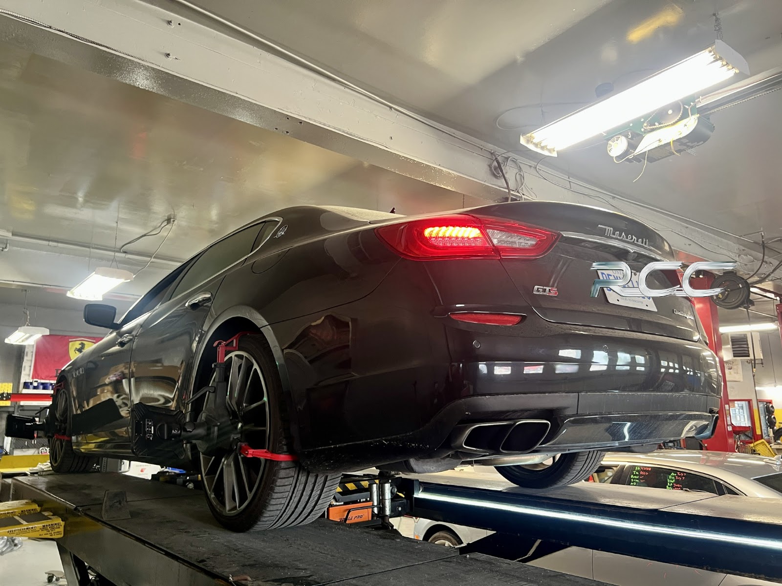 Maserati raised on the lift for service